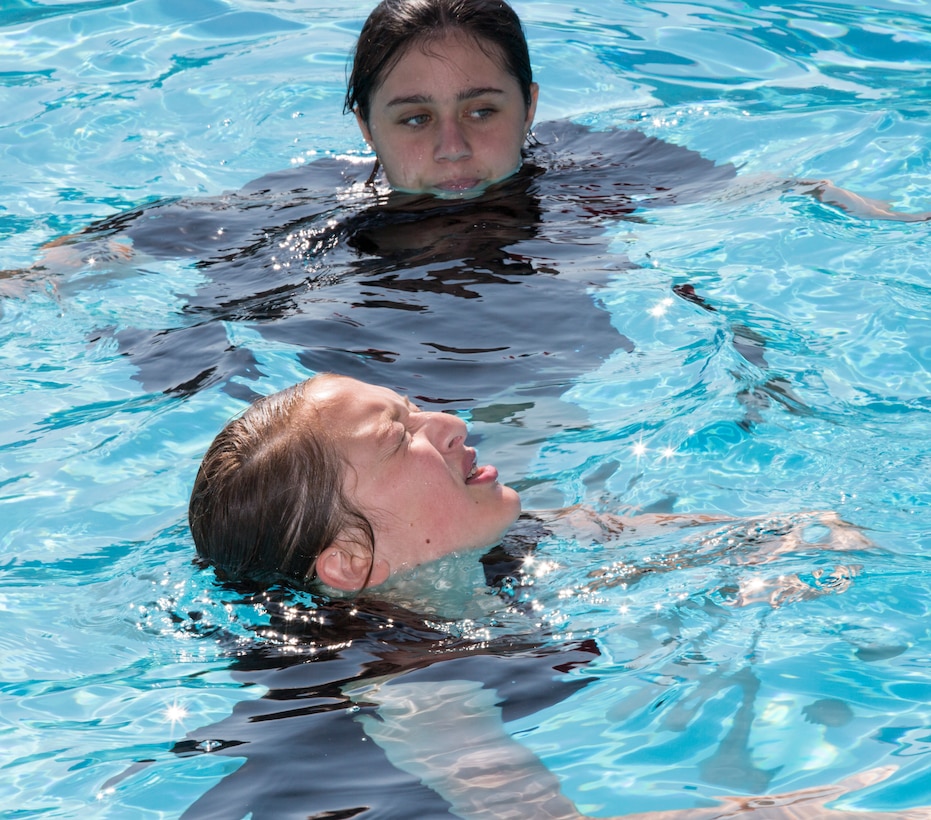 Aubrie Moya-Lupercio, age 13, treading water during swim qualification for the Excelsior Charter School's Young Marines Program, July 26. The Young Marines Program conducts a recruit training evolution annually for those youngsters entering the program for the first time.