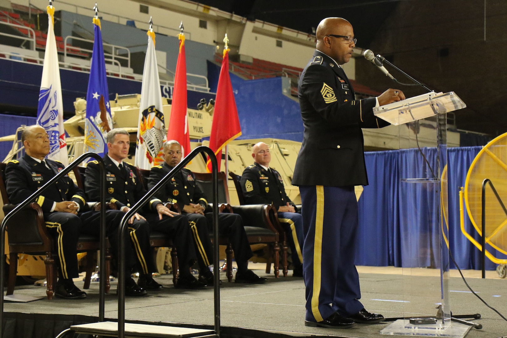 WASHINGTON- Command Sgt. Maj. Terrance A. Smith addresses Soldiers during the Land Component Command (LCC) change of responsibility ceremony, June 10, 2018 at the District of Columbia Armory. Smith will serve as an enlisted adviser to Brig. Gen. Robert K. Ryan, Commander, LCC, D.C. National Guard. (U.S. Army National Guard photo by Sgt. Adrian Shelton/Released)