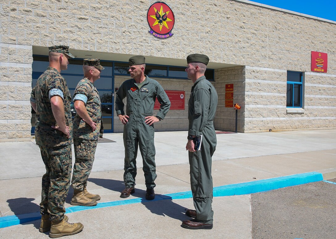 Maj. Gen. Kevin M. Iiams, the Commanding General of 3rd Marine Aircraft Wing (MAW) speaks to U.S. Marines with Marine Tactical Air Squadron (MTACS) 38 and Marine Wing Communication Squadron (MWCS) 38, Marine Air Control Group, 3rd MAW at Marine Corps Air Station Miramar, Calif., July 24. Summer Fury is designed to increase the functionality and effectiveness of 3rd MAW, while also enhancing Marine-Air Ground Task Force and naval integration with participating I Marine Expeditionary Force and naval units. (U.S. Marine Corps photo by Cpl. Ariana Acosta/Released)