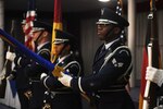 Air Force Senior Airman Pascal Nyowatchon, 435th Air Ground Operations Wing, performs a ceremonial honor guard drill at Ramstein Air Base, Germany.