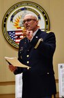 Chief Warrant Officer 5 Michael R. Jewett, command chief warrant officer, District of Columbia National Guard, presents his vision for the D.C. Army National Guard warrant officer cohort, on Feb. 27, in the Commanding General’s Conference Room of the D.C. Armory, in Washington, D.C. Jewett shared his thoughts during a reception celebrating 100 years of the U.S. Army warrant officer corps. (U.S. Army National Guard photo and caption by Spc. Kevin Valentine/released)