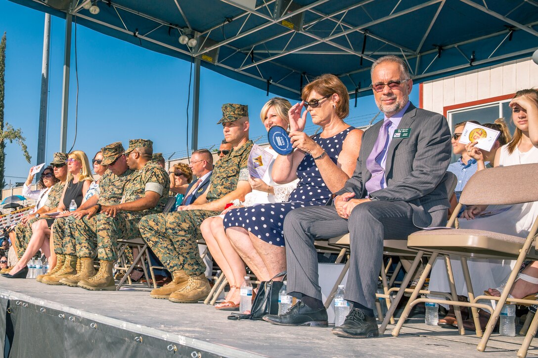 Many local dignitaries such as Tim Silva, Basrtow city councilman, and Barstow City Major Julie Hackbarth-McIntyre, attended the change of command ceremony in which Col. Sekou Karega relinquished command to Col. Craig Clemans aboard Marine Corps Logistics Base Barstow, Calif., July 19.