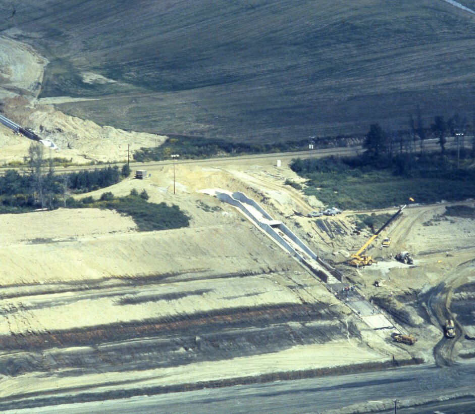 This is an aerial view of the Tennessee-Tombigbee Waterway under construction Sept. 4, 1981. The U.S. Army Corps of Engineers Nashville District built the northern 29 miles of the project, including the massive 27-mile divide cut, which connected the waterway with Pickwick Lake on the Tennessee River. (USACE Photo)