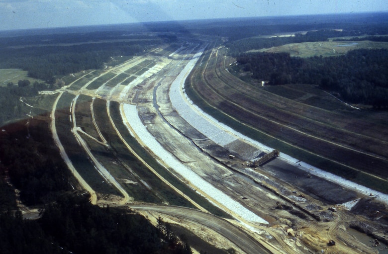 This is an aerial view of the Tennessee-Tombigbee Waterway under construction Sept. 12, 1981. The U.S. Army Corps of Engineers Nashville District built the northern 29 miles of the project, including the massive 27-mile divide cut, which connected the waterway with Pickwick Lake on the Tennessee River. (USACE Photo)