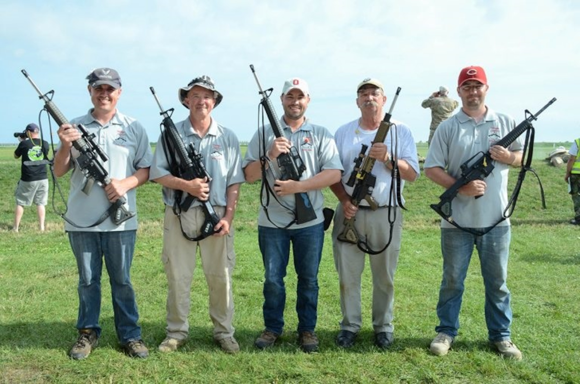 Air Force Office of Special Investigations Special Agent David Ohlinger, left, Air Force Special Investigations Academy, Operating Location-A, Fort Washington, Md., is the fifth member of his family, pictured during the 2017 National Matches, to receive the highest individual award for excellence in marksmanship authorized by the U.S. Government open to all civilians and military branches. (Civilian Marksmanship Program photo)