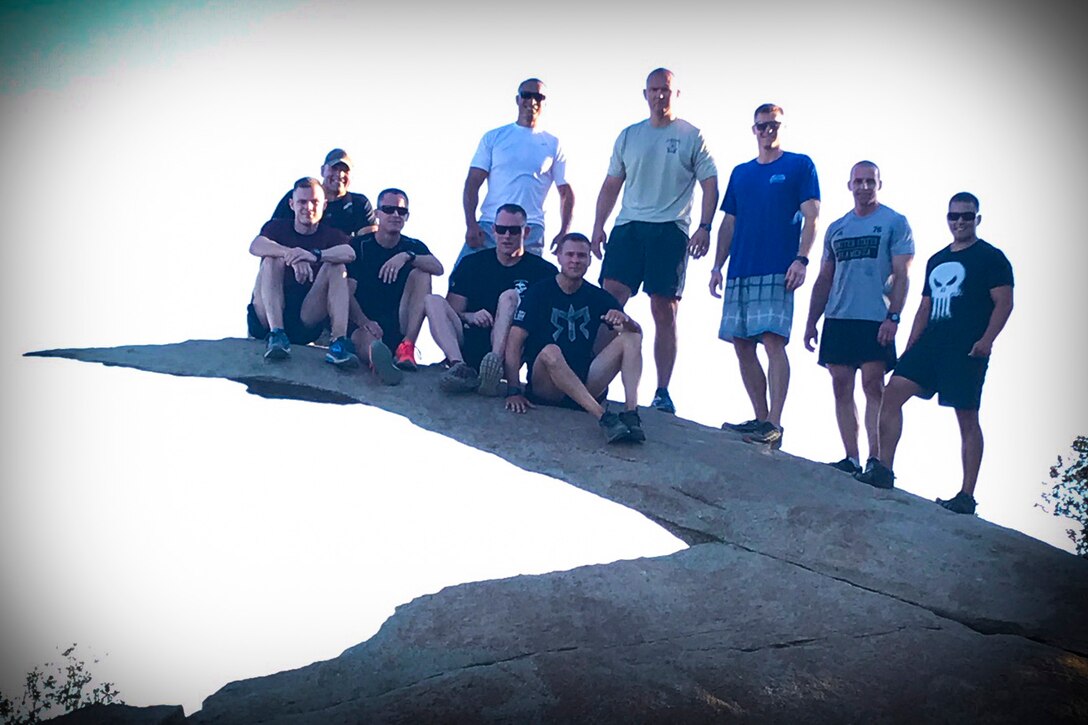 FORCE 12 Commanders seize the summit of Mt. Woodson during a recent Professional Military Education (PME) event in Poway, Calif., July 27, 2018.