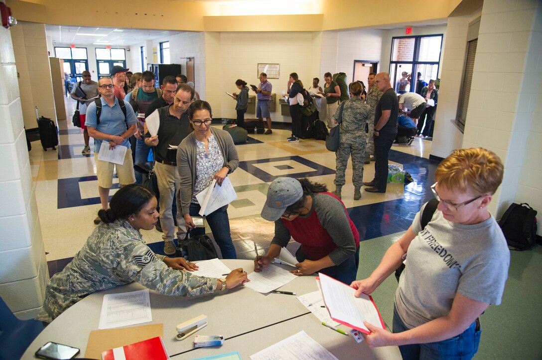 U.S. Air Force Tech. Sgt. Brena Jones, of Pittsburgh, Pa., from the Air Force Reserve’s 914th Force Support Squadron, Niagara Falls, N.Y., in processes military medical providers and support staff July 8, 2018, in Warrenton, Ga., for the East Central Georgia Innovative Readiness Training July 11-18, 2018. The IRT event is a joint-service medical mission comprised of members of the Navy Reserve, Air National Guard, Air Force Reserve, Active Duty Air Force and Navy, which provides service members with the opportunity to strengthen their occupational skills and enhance the lives of area residents. (U.S. Air Force photo by Master Sgt. Theanne Herrmann)