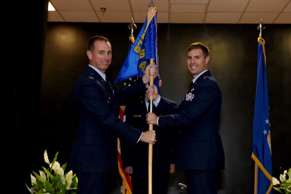 U.S. Air Force Maj Marshalia Vaghans, commander of the 97th Communications Squadron, assumes command, July, 27, 2018, at Altus Air Force Base, Okla.