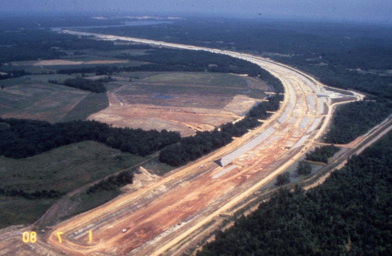 This is an aerial view of the Tennessee-Tombigbee Waterway under construction Jan. 7, 1980. The U.S. Army Corps of Engineers Nashville District built the northern 29 miles of the project, including the massive 27-mile divide cut, which connected the waterway with Pickwick Lake on the Tennessee River. (USACE Photo)