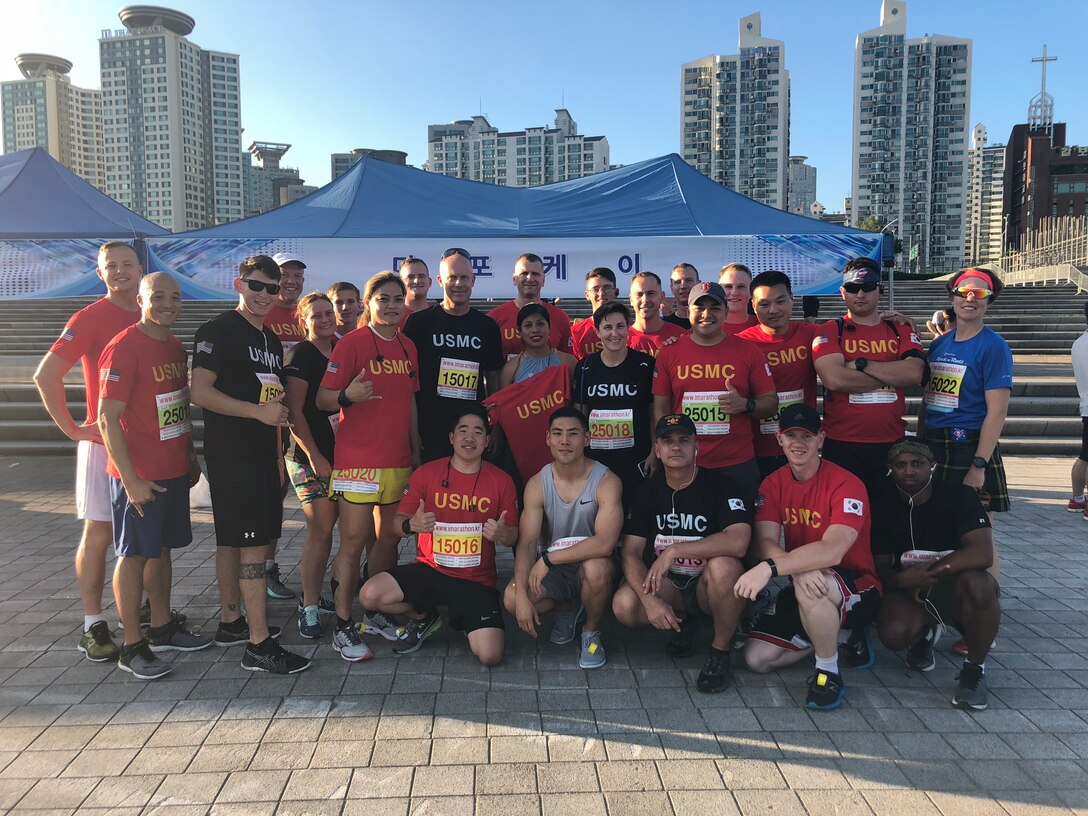 USAG YONGSAN GARRISON, SEOUL – A U.S. Marine Corps Forces Korea team prepares to run the Seoul Night Run here, July 14. The Seoul Night Run included a 5k, 10k, and half marathon road race. (Courtesy photos/Released)