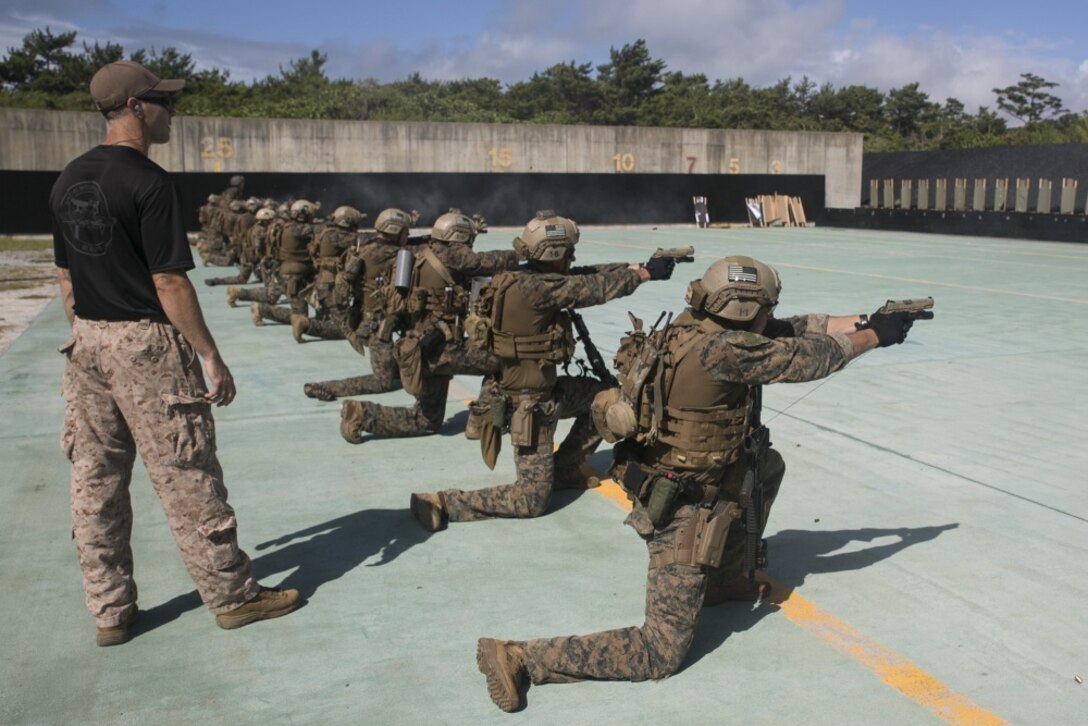 Marines with the 31st Marine Expeditionary Unit’s Force Reconnaissance Platoon fire M1911 .45-caliber pistols during marksmanship training as part of Realistic Urban Training Exercise at Camp Hansen, Okinawa, Japan, July 17, 2018.