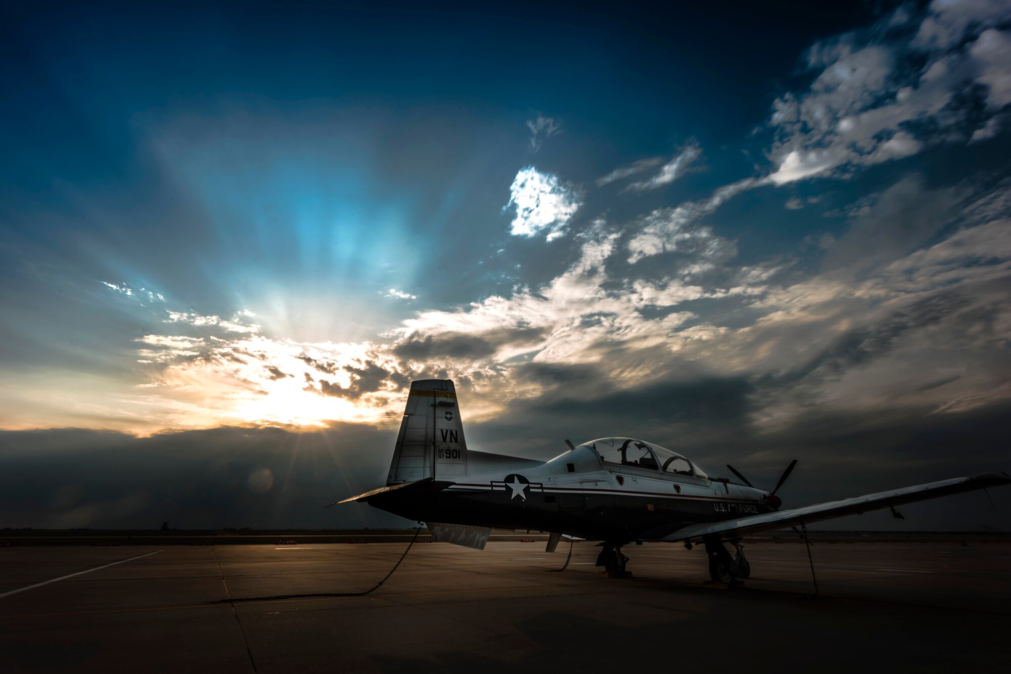 A T-6A Texan II is used to train specialized undergraduate pilots at Vance Air Force Base, Oklahoma April 24, 2018. The Texan has a thrust-to-weight ratio that allows the aircraft to perform an initial climb of 3,100 ft per minute and reach a height of 18,000 ft in less than six minutes. (U.S. Air Force photo by Erik Cardenas)
