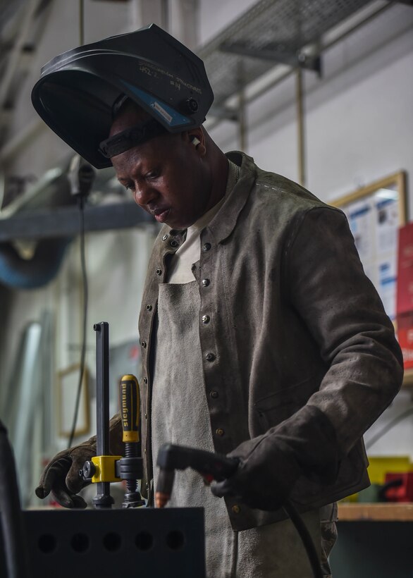 Tech. Sgt. Anthony Williams, a structural craftsman with the 910th Civil Engineer Squadron, prepares to use a plasma cutter at the 52nd CES’s metal shop on Spangdahlem Air Base, July 16, 2018.