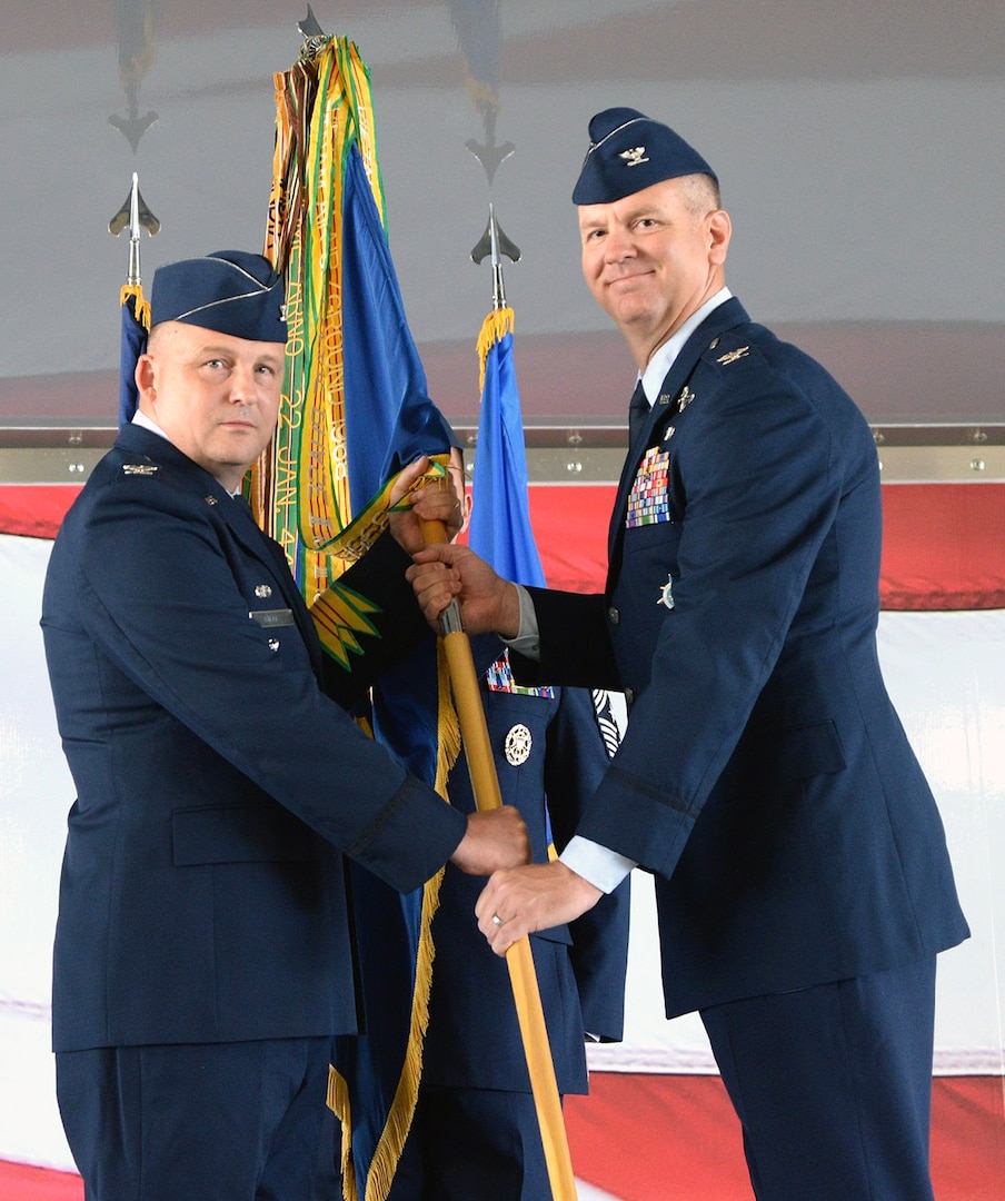 Col. Mark S. Robinson (right) assumed command of the 12th Flying Training Wing in a ceremony at Joint Base San Antonio-Randolph July 27. Col. Travis Willis (left), 19th Air Force vice commander, presided over the ceremony.
