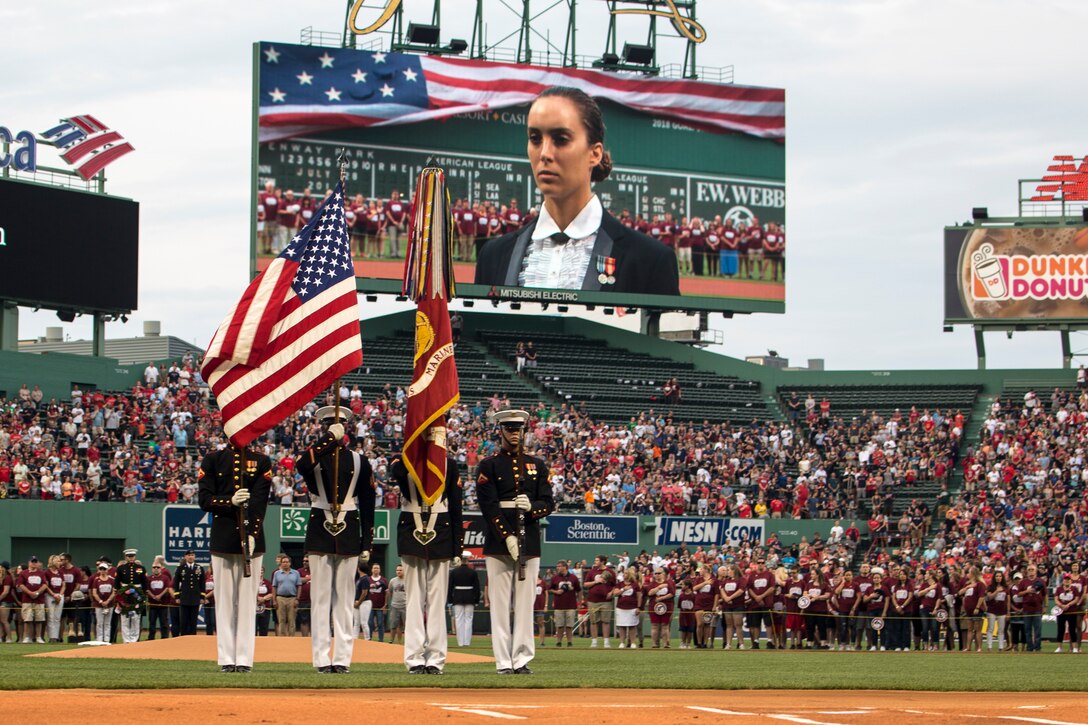 Marines with the U.S. Marine Corps Color Guard carry the Marine Corps Battle Colors and the National ensign during the opening of a Red Sox game at Fenway Park, Boston, Massachusetts, July 28, 2018. The official Color Guard is the only Color Guard that carries the Battle Colors of the Marine Corps.