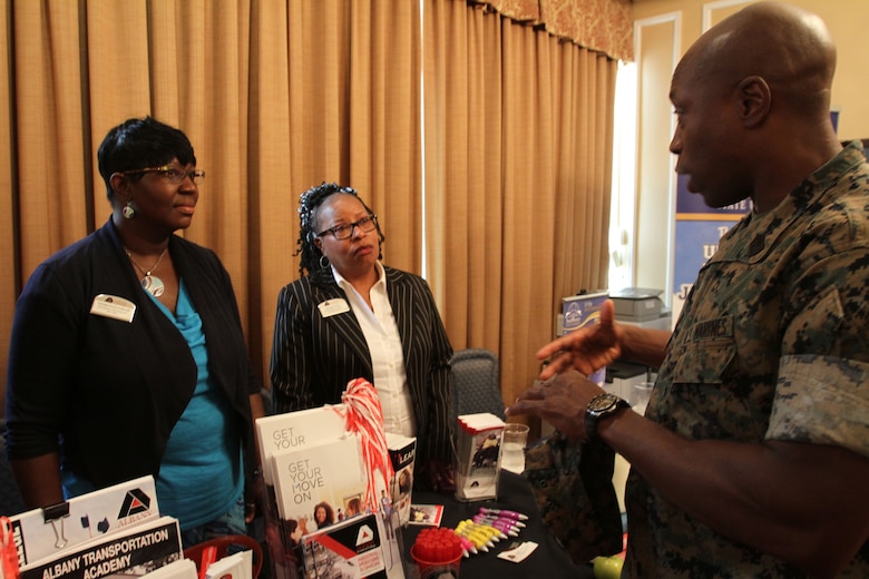 Marine Corps Logistics Base Albany Sgt. Maj. Johnny Higdon spoke with dual enrollment advisors from Albany Technical College during the Military Child Educational Summit, July 24. As the school year quickly approaches, active-duty families aboard MCLB Albany received information about various school districts and educational opportunities in Southwest Georgia. Leaders from both public and private schools showcased their programs. (U.S. Marine Corps photo by Re-Essa Buckels)