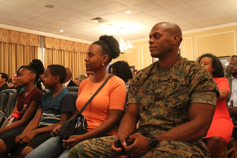 U. S. Marine Corps Master Sgt. Glen Gumbs and his spouse, Nicole, and their two children attend the Military Child Educational Summit, July 24, at Marine Corps Logistics Base Albany. As the school year quickly approaches, active-duty families aboard MCLB Albany received information about various school districts and educational opportunities in Southwest Georgia. Leaders from both public and private schools showcased their programs. (U.S. Marine Corps photo by Re-Essa Buckels)