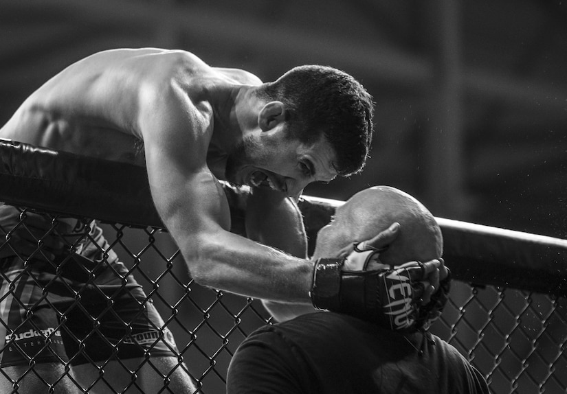 Left, Adi Alec, mixed martial art fighter, celebrates his win during the Legacy Fighting Alliance live broadcast at Joint Base Langley-Eustis, Virginia, July 27, 2018.