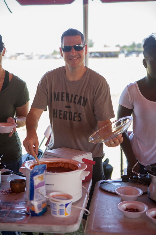 U.S. Marine Corps Maj. Robert M. Storck, Executive Officer of Headquarters and Headquarters Squadron, shows the chili he entered in the H&HS “Chili Cook-Off and three point shootout” at Marine Corps Air Station Miramar, Calif., July 27.  The event was hosted by the H&HS as part of the monthly “Warrior Challenge” competition, bringing the unit together through various events throughout the year.
