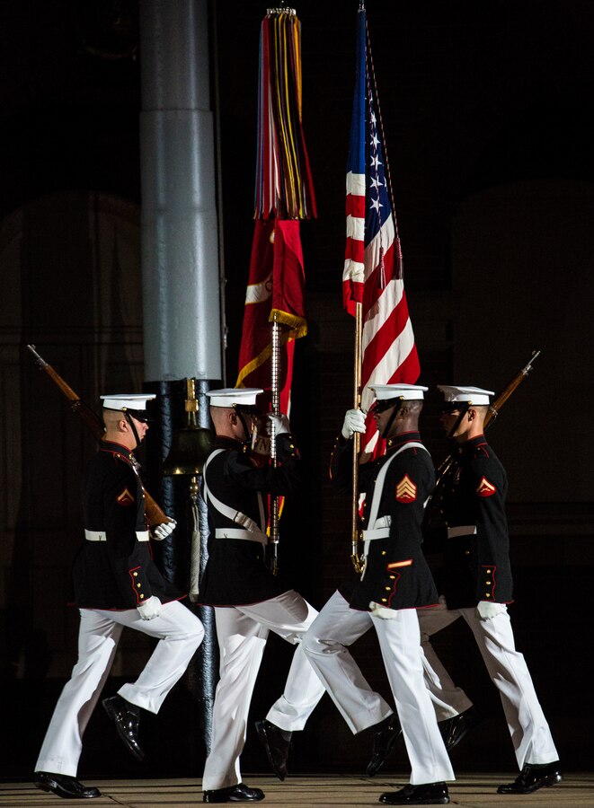 Marines with the U.S. Marine Corps Color Guard execute a “counter march” during the Staff-Noncommissioned Officer Friday Evening Parade at Marine Barracks Washington D.C., July 27, 2018. During the SNCO Friday Evening Parade, SNCO’s assume the billets of key leaders’ marching positions normally filled by officers and non-commissioned officers.