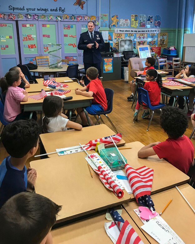 U.S. Air Force Capt. John DeLaurentis, 363rd Intelligence, Surveillance and Reconnaissance Wing deputy director, plans and programs, speaks to students at Sherman Elementary School in Roselle, New Jersey, May 30, 2018. DeLaurentis spoke to the first-grade class about their goals in hopes to inspire and motivate them. (Courtesy Photo)