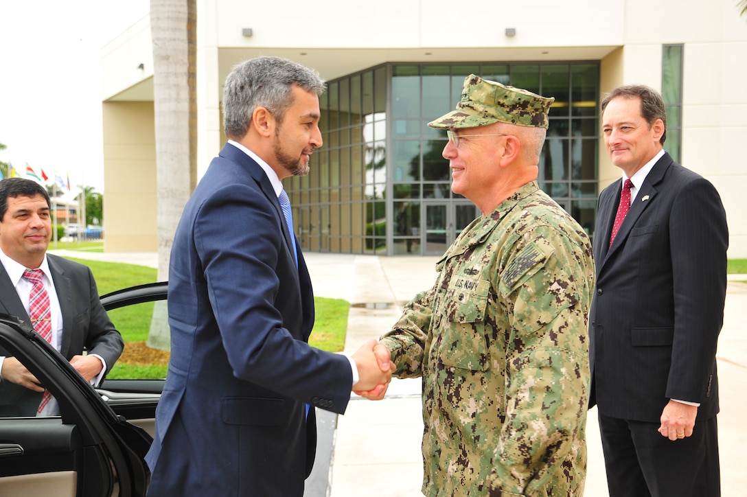 U.S. Navy Adm. Kurt Tidd greets Paraguay President-elect Mario Abdo Benitez.