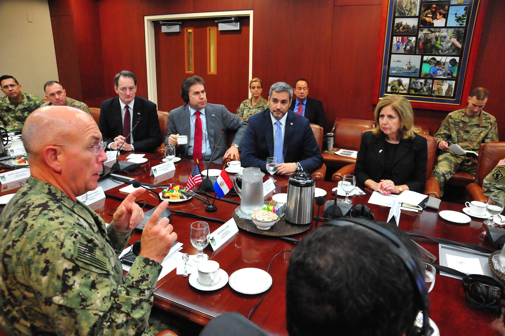 Mario Abdo Benitez, President-elect of Paraguay, listens to U.S. Navy Adm. Kurt Tidd.