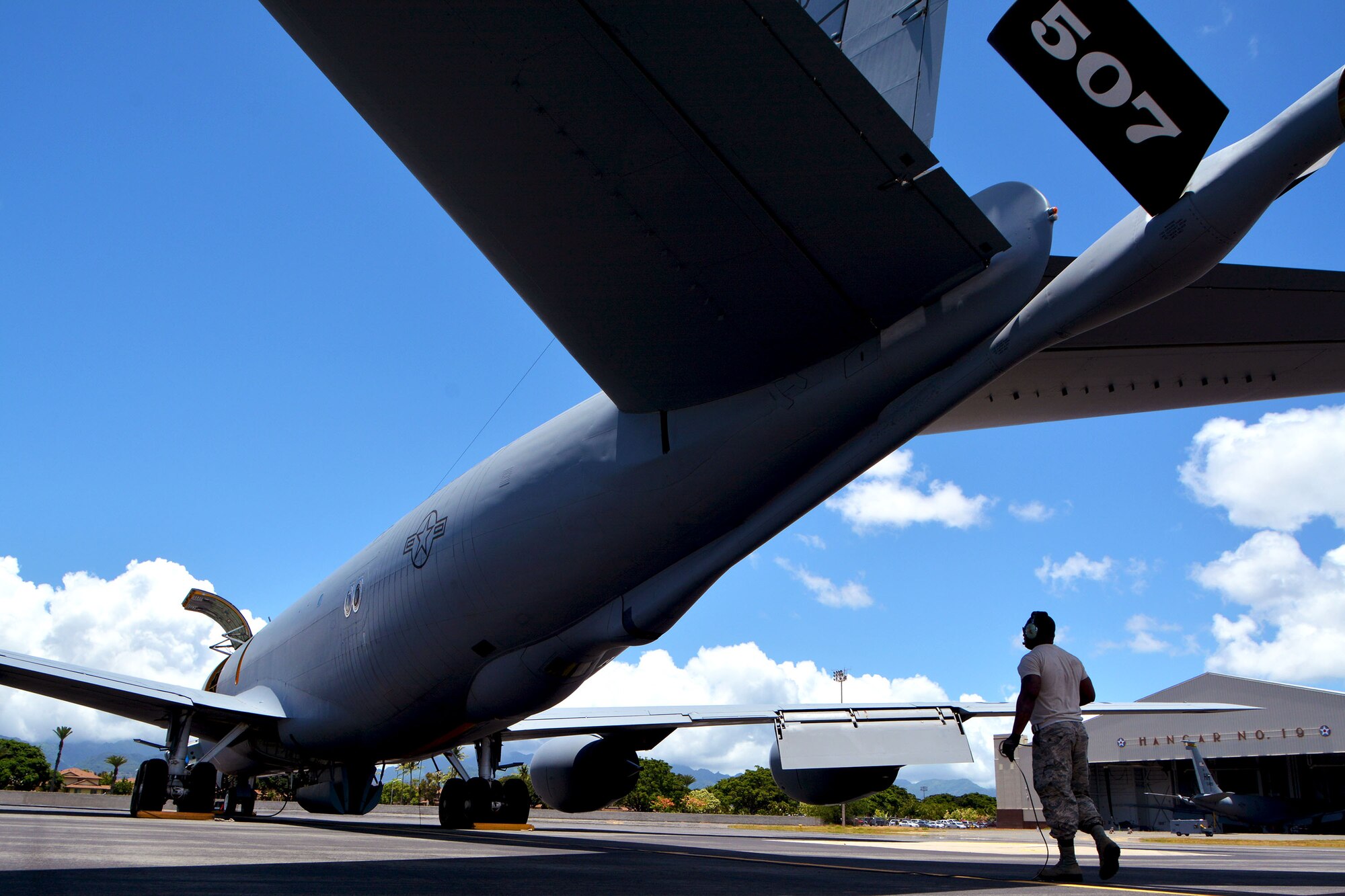 Staff Sgt. Reginald Felton, 507th Maintenance Squadron crew chief, prepares a KC-135R Stratotanker for flight, July 9. Twenty-five nations, 46 ships, five submarines, and about 200 aircraft and 25,000 personnel are participating in RIMPAC from June 27 to Aug. 2 in and around the Hawaiian Islands and Southern California. The world’s largest international maritime exercise, RIMPAC provides a unique training opportunity while fostering and sustaining cooperative relationships among participants critical to ensuring the safety of sea lanes and security of the world’s oceans. RIMPAC 2018 is the 26th exercise in the series that began in 1971. (U.S. Air Force photo by Tech. Sgt. Samantha Mathison)