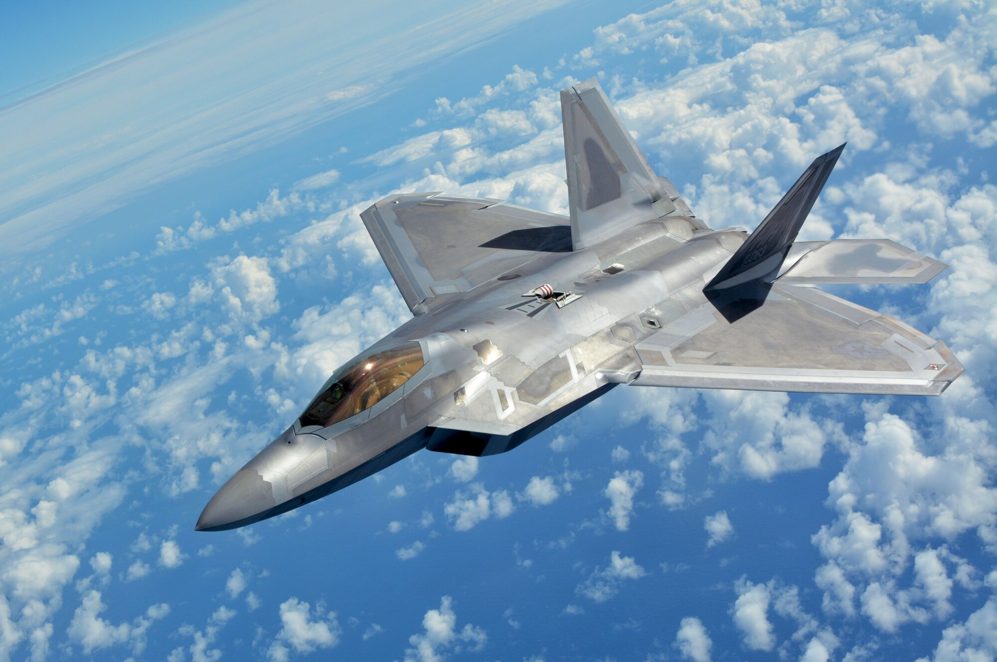 JOINT BASE PEARL HARBOR-HICKAM, Hawaii - A 154th Wing Hawaii Air National Guard F-22 Raptor flies behind a 434th Air Refueling Wing KC-135 Stratotanker from Grissom Air Reserve Base, Indiana, near Hawaii during the Rim of the Pacific (RIMPAC) exercise July 17. Twenty-five nations, 46 ships, five submarines, and about 200 aircraft and 25,000 personnel are participating in RIMPAC from June 27 to Aug. 2 in and around the Hawaiian Islands and Southern California. The world’s largest international maritime exercise, RIMPAC provides a unique training opportunity while fostering and sustaining cooperative relationships among participants critical to ensuring the safety of sea lanes and security of the world’s oceans. RIMPAC 2018 is the 26th exercise in the series that began in 1971. (U.S. Air Force photo by Tech. Sgt. Samantha Mathison)