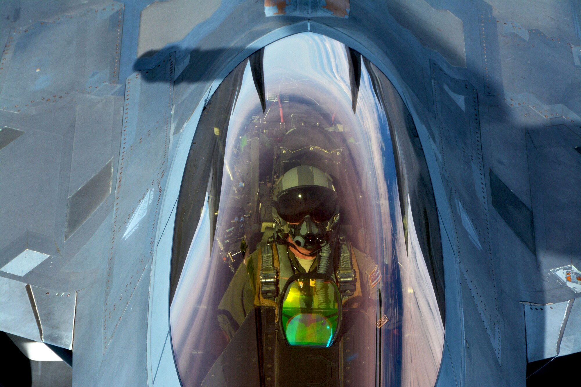 A 154th Wing Hawaii Air National Guard F-22 Raptor pilot performs in-flight refueling with a 434th Air Refueling Wing KC-135 Stratotanker from Grissom Air Reserve Base, Indiana, near Hawaii during the Rim of the Pacific (RIMPAC) exercise July 17. Twenty-five nations, 46 ships, five submarines, and about 200 aircraft and 25,000 personnel are participating in RIMPAC from June 27 to Aug. 2 in and around the Hawaiian Islands and Southern California. The world’s largest international maritime exercise, RIMPAC provides a unique training opportunity while fostering and sustaining cooperative relationships among participants critical to ensuring the safety of sea lanes and security of the world’s oceans. RIMPAC 2018 is the 26th exercise in the series that began in 1971. (U.S. Air Force photo by Tech. Sgt. Samantha Mathison)