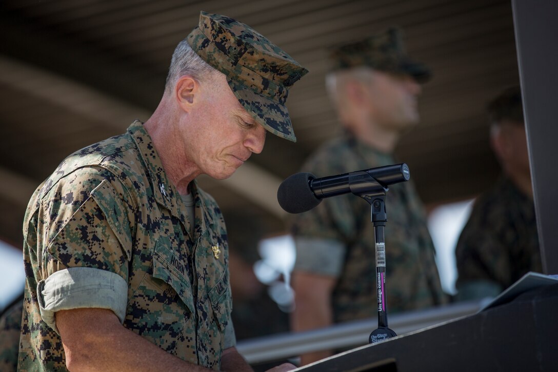 U.S. Navy Capt. Dwight Horn, I Marine Expeditionary Force chaplain, gives the invocation during the I MEF change of command ceremony held at Camp Pendleton, California, July 30, 2018. During the ceremony, Lt. Gen. Lewis A. Craparotta relinquished command of I MEF to Lt. Gen. Joseph L. Osterman. (U.S. Marine Corps photo by Lance Cpl. Dalton S. Swanbeck)