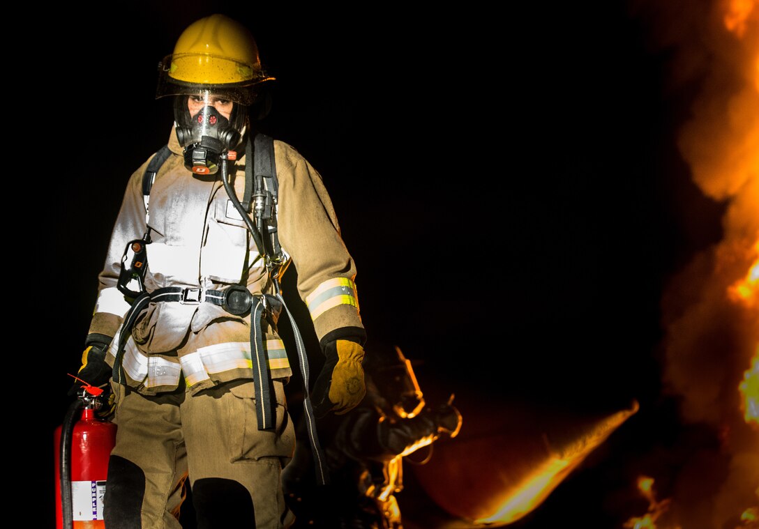 Sgt. Terence Moran, a lead firefighter with Aircraft Rescue and Fire Fighting, participates in a controlled burn training exercise aboard Marine Corps Air Station Beaufort July 30. The training simulated a jet fire and familiarized Marines with their equipment and standard operating procedures. MCAS Beaufort’s ARFF unit is responsible to respond to emergencies not only aboard the air station, but also throughout Beaufort County.