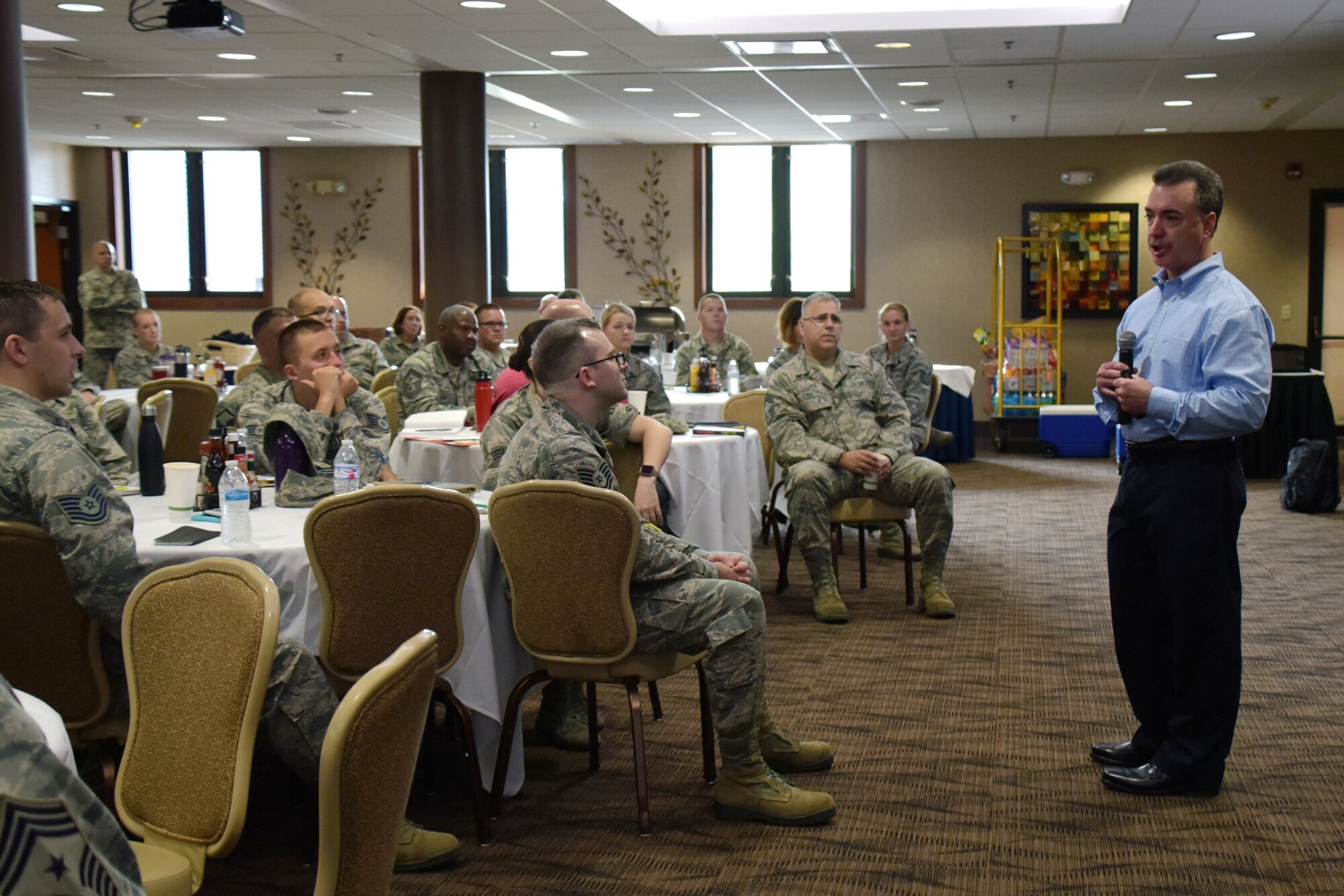 Dennis Flynn, the Commerce City, Colorado Police Department Commander, provides an impactful presentation about PTSD to Airmen during the Enlisted Leadership Symposium, Jul. 25, at Youngstown-Warren Air Reserve Station in Vienna, Ohio. Flynn brought a unique perspective to the table because he worked as a hostage negotiator for several years where he encountered veterans suffering from PTSD firsthand.