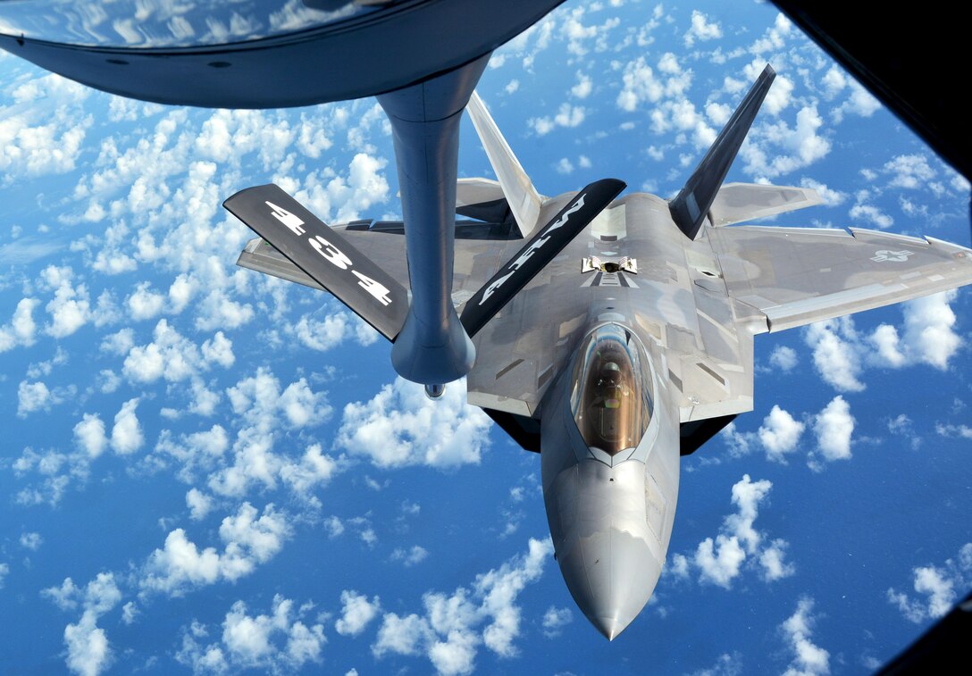 A 154th Wing Hawaii Air National Guard F-22 Raptor approaches the refueling boom of a 434th Air Refueling Wing KC-135 Stratotanker from Grissom Air Reserve Base, Indiana, while in flight near Hawaii during the Rim of the Pacific (RIMPAC) exercise July 17. Twenty-five nations, 46 ships, five submarines, and about 200 aircraft and 25,000 personnel are participating in RIMPAC from June 27 to Aug. 2 in and around the Hawaiian Islands and Southern California. The world’s largest international maritime exercise, RIMPAC provides a unique training opportunity while fostering and sustaining cooperative relationships among participants critical to ensuring the safety of sea lanes and security of the world’s oceans. RIMPAC 2018 is the 26th exercise in the series that began in 1971. (U.S. Air Force photo by Tech. Sgt. Samantha Mathison)