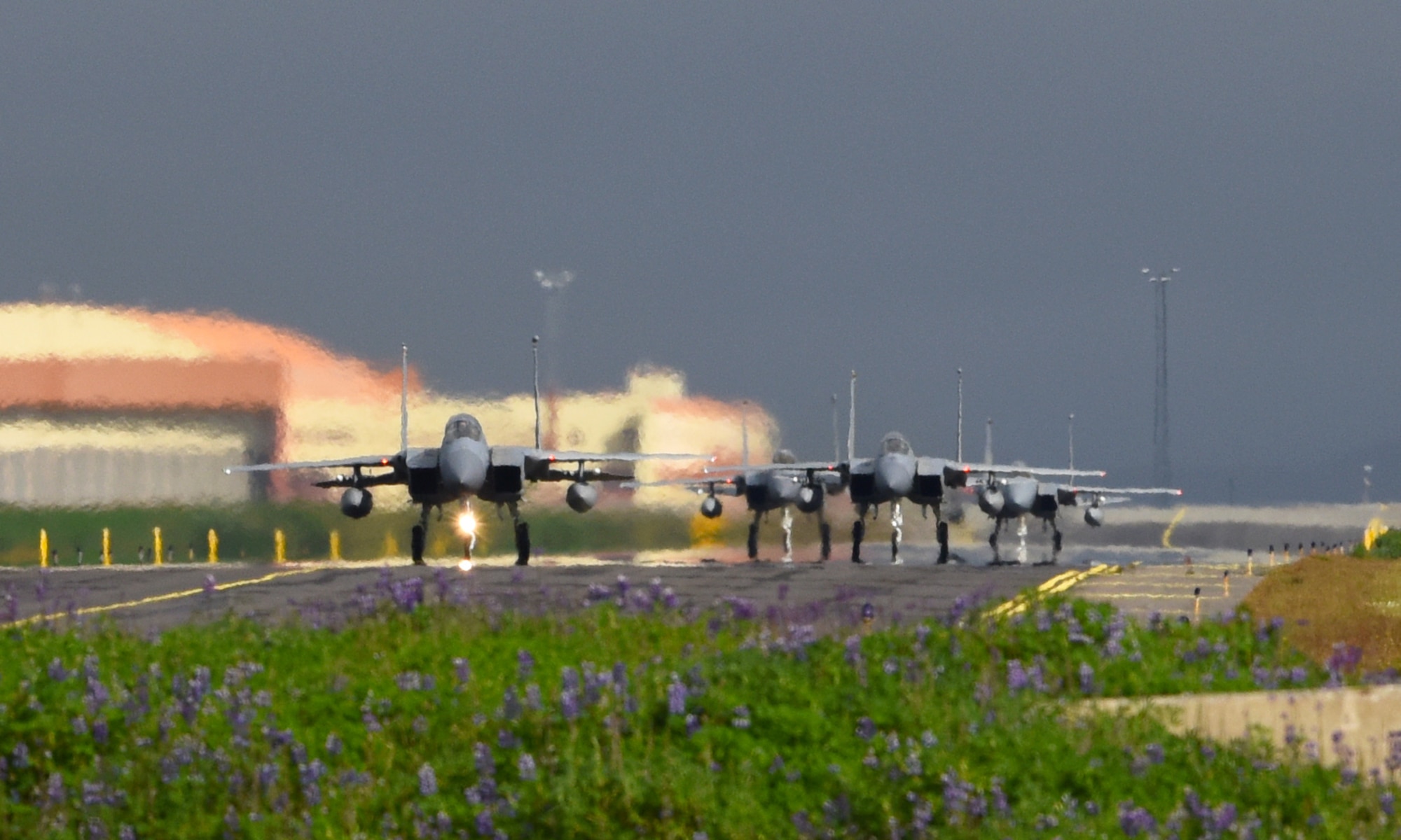 Four F-15C Eagles assigned to the 493rd Expeditionary Fighter Squadron taxi at Keflavik Air Base, Iceland, July 30, 2018 in support of NATO’s Icelandic Air Surveillance mission. IAS promotes regional stability and security, while strengthening partner capabilities and fostering trust. (U.S. Air Force photo/ Staff Sgt. Alex Fox Echols III)