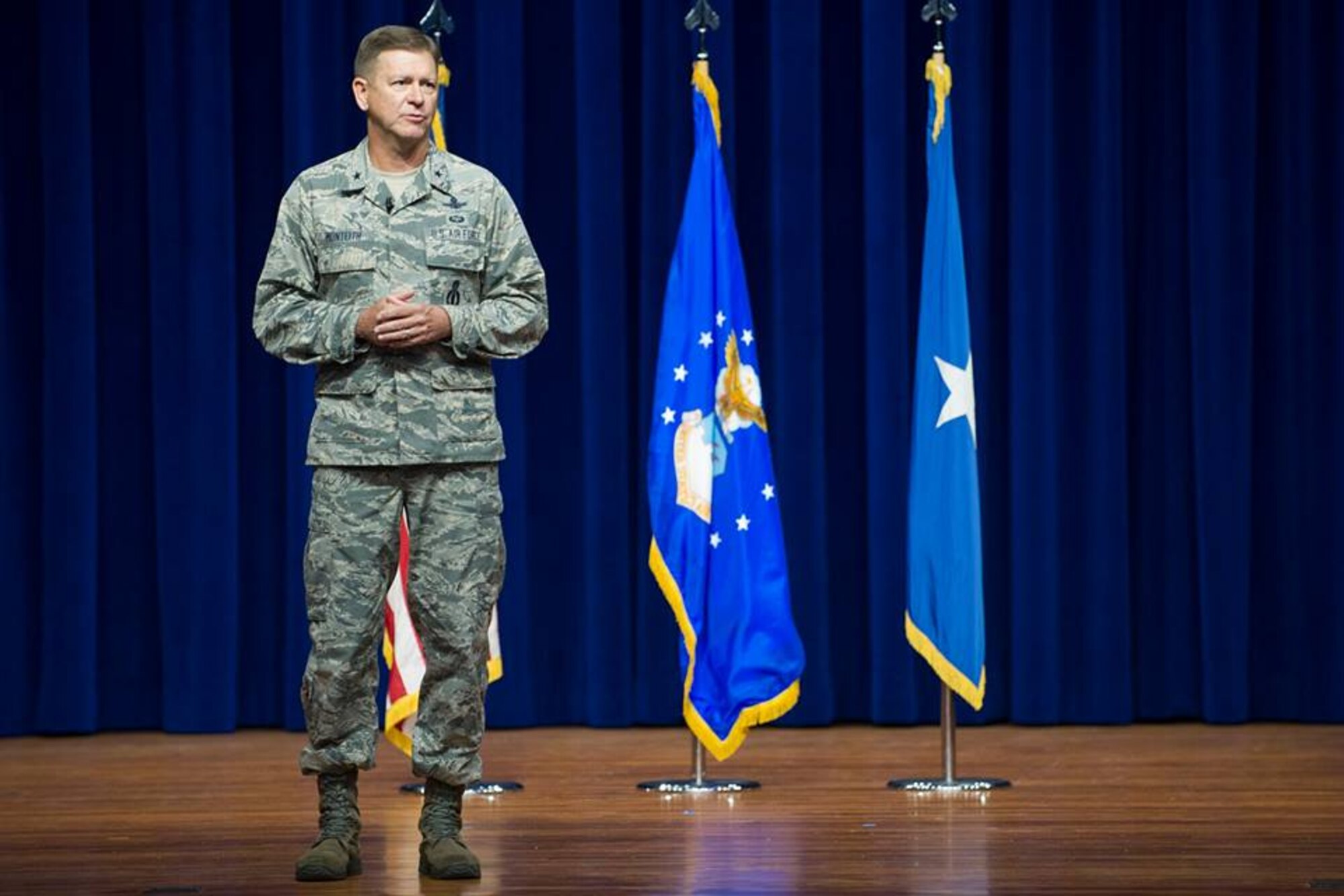 Brig. Gen. Wayne Monteith, commander of the 45th Space Wing, addresses Airmen, July 31, 2018 at the Sharkatorium on Patrick Air Force Base, Fla. Monteith drove the initiative to eliminate seams between groups and squadrons, making the 45th SW more efficient. (U.S. Air Force photo by Phillip Sunkel)