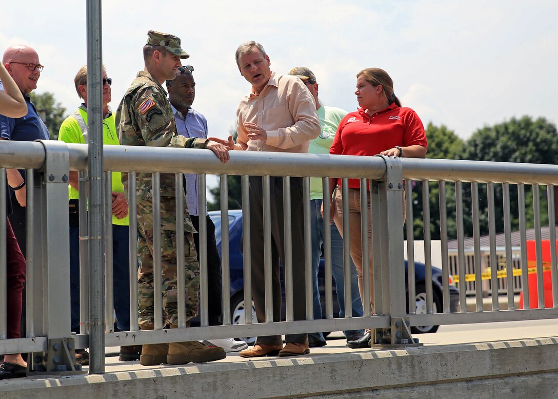 Col. John Litz, U.S. Army Corps of Engineers, Baltimore District commander, speaks with Michael Helfrich, mayor of York, Pennsylvania, following the collapse of a section of channel wall along Codorus Creek immediately upstream of the Philadelphia Street Bridge in York, July 27, 2018. (U.S. Army photo by David Gray)