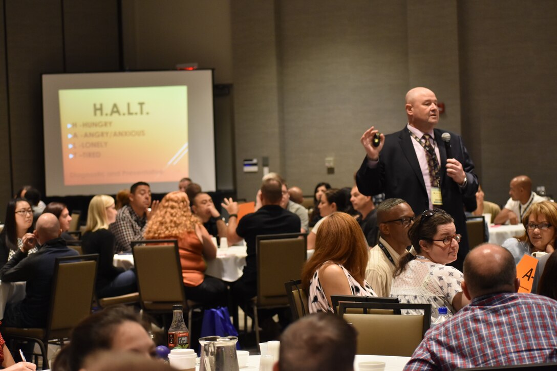 Michael Wikstrom, the suicide prevention program manager for the 88th Readiness Division, conducts a training session during the 88th Readiness Division’s Yellow Ribbon Reintegration Program event, in Schaumburg, Ill., July 21. (U.S. Army photo by Catherine Carroll/Released)