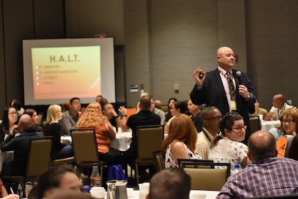 Michael Wikstrom, the suicide prevention program manager for the 88th Readiness Division, conducts a training session during the 88th Readiness Division’s Yellow Ribbon Reintegration Program event, in Schaumburg, Ill., July 21. (U.S. Army photo by Catherine Carroll/Released)