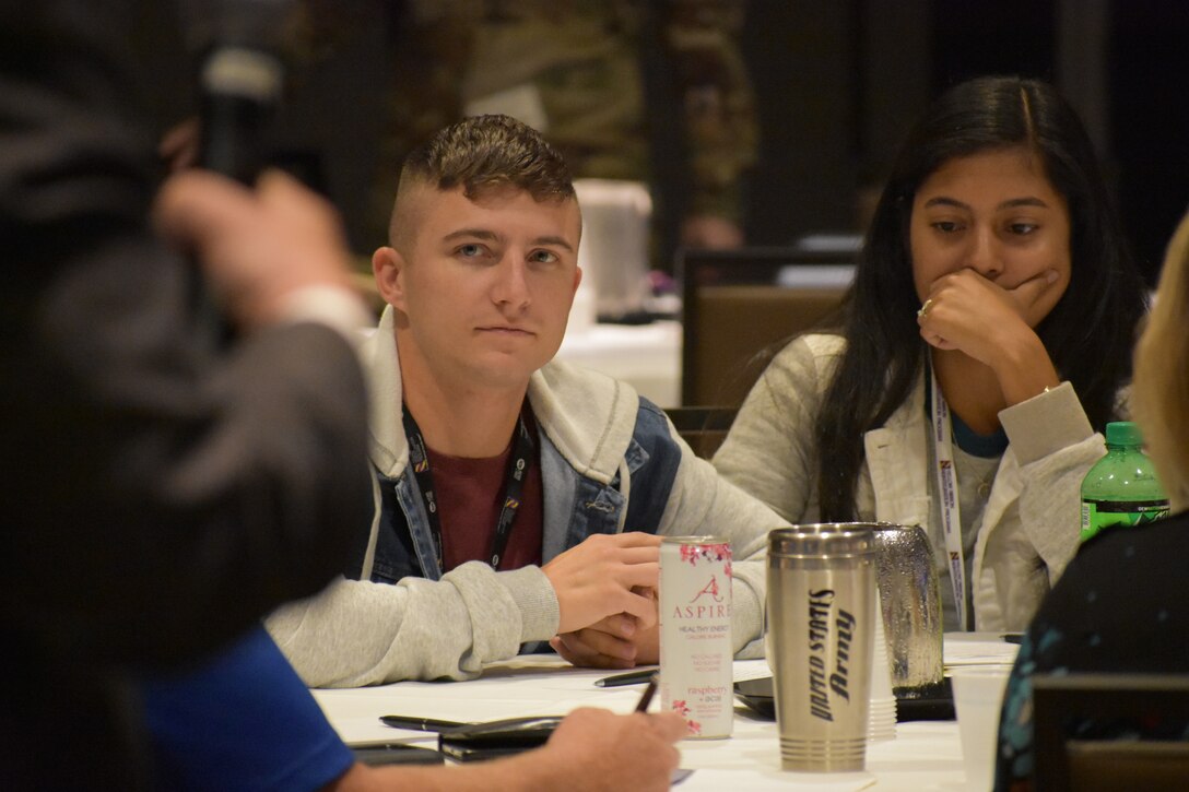 U.S. Army Reserve Soldiers and their families participate in a training session during the 88th Readiness Division’s Yellow Ribbon Reintegration Program event, in Schaumburg, Ill., July 22. (U.S. Army photo by Catherine Carroll/Released)