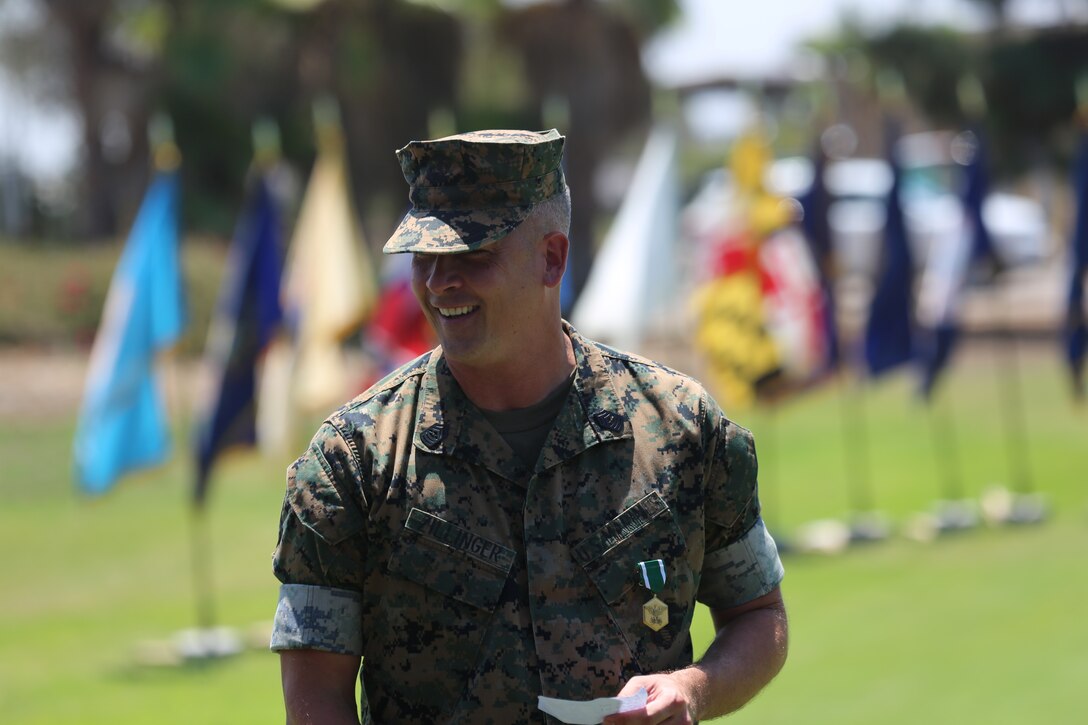 U.S. Marine Corps Master Sgt. Geanni Zillinger, station food service technical representative, expresses his gratitude to family and friends during his retirement ceremony at Marine Corps Air Station Miramar, Calif., July 27. Zillinger retired after serving 26 years of honorable military service. (U.S. Marine Corps photo by Sgt. Daniel Auvert/ Released)