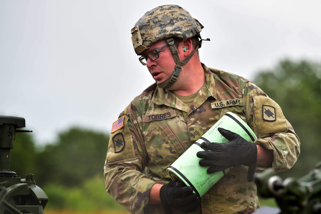 Arkansas National Guard soldier waits for further instructions during the exercise.