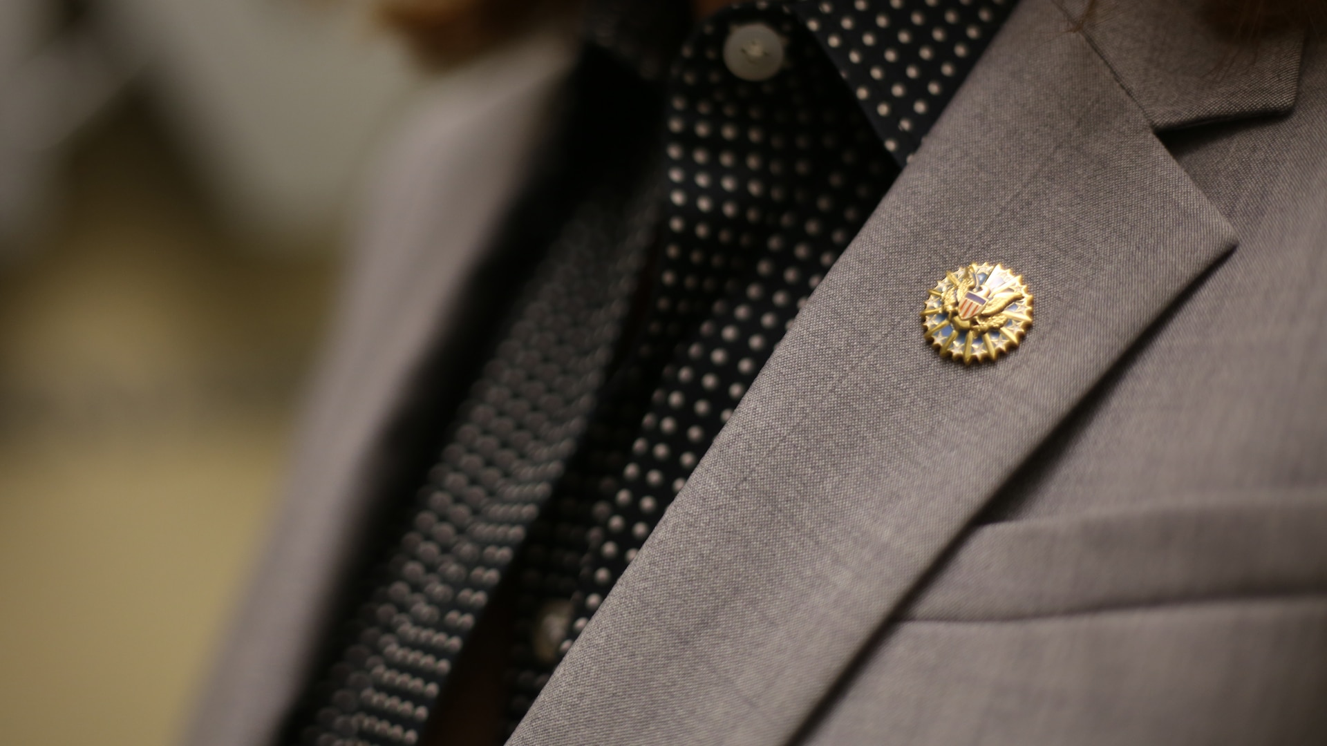 Civilian personnel of the Defense Contract Management Agency are now able to purchase and wear the new organization badge and lapel pin. (DCMA photo by Elizabeth Szoke)