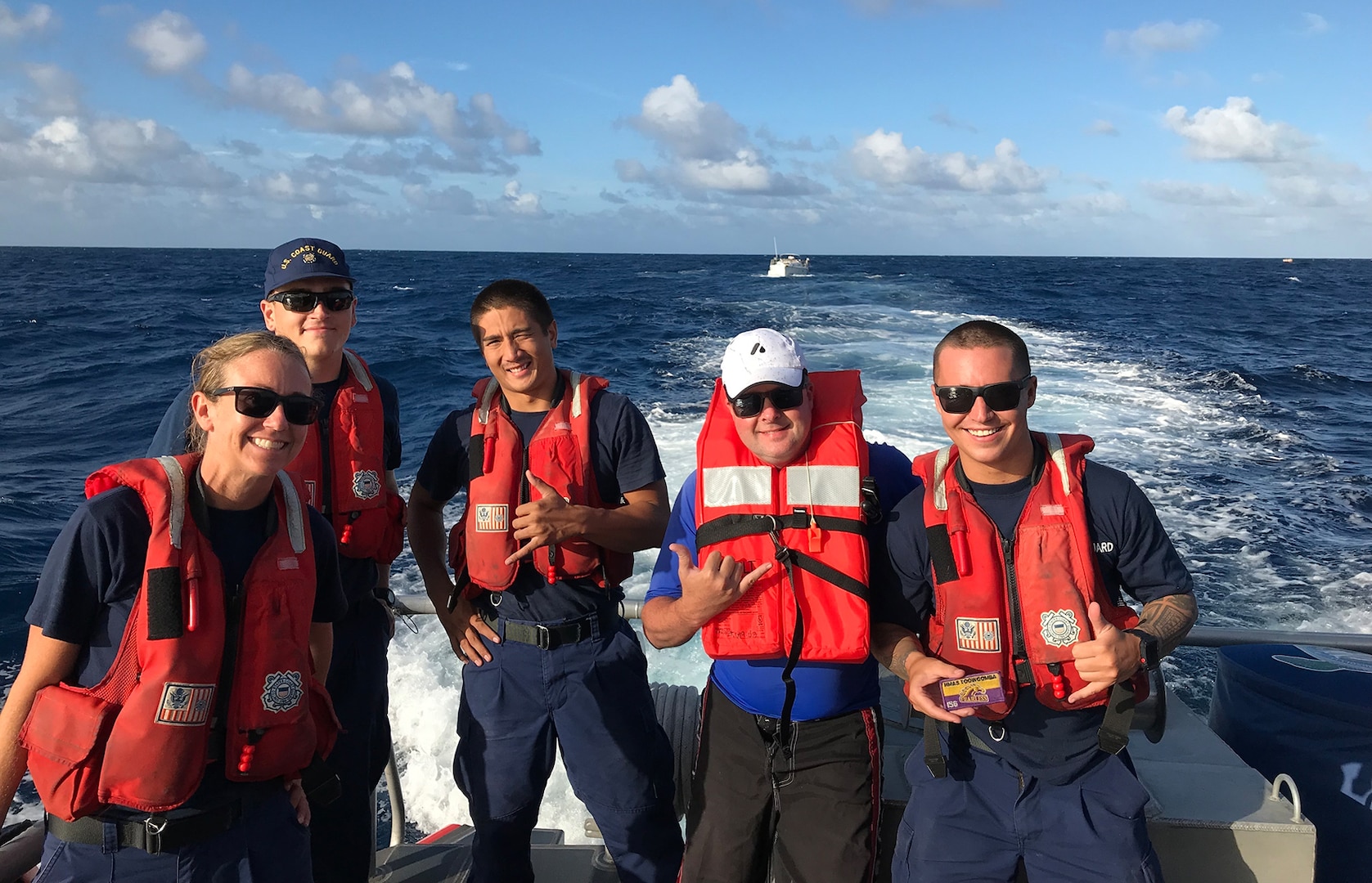 Coast Guard, Royal Australian Navy Assist Sailing Crew in Distress