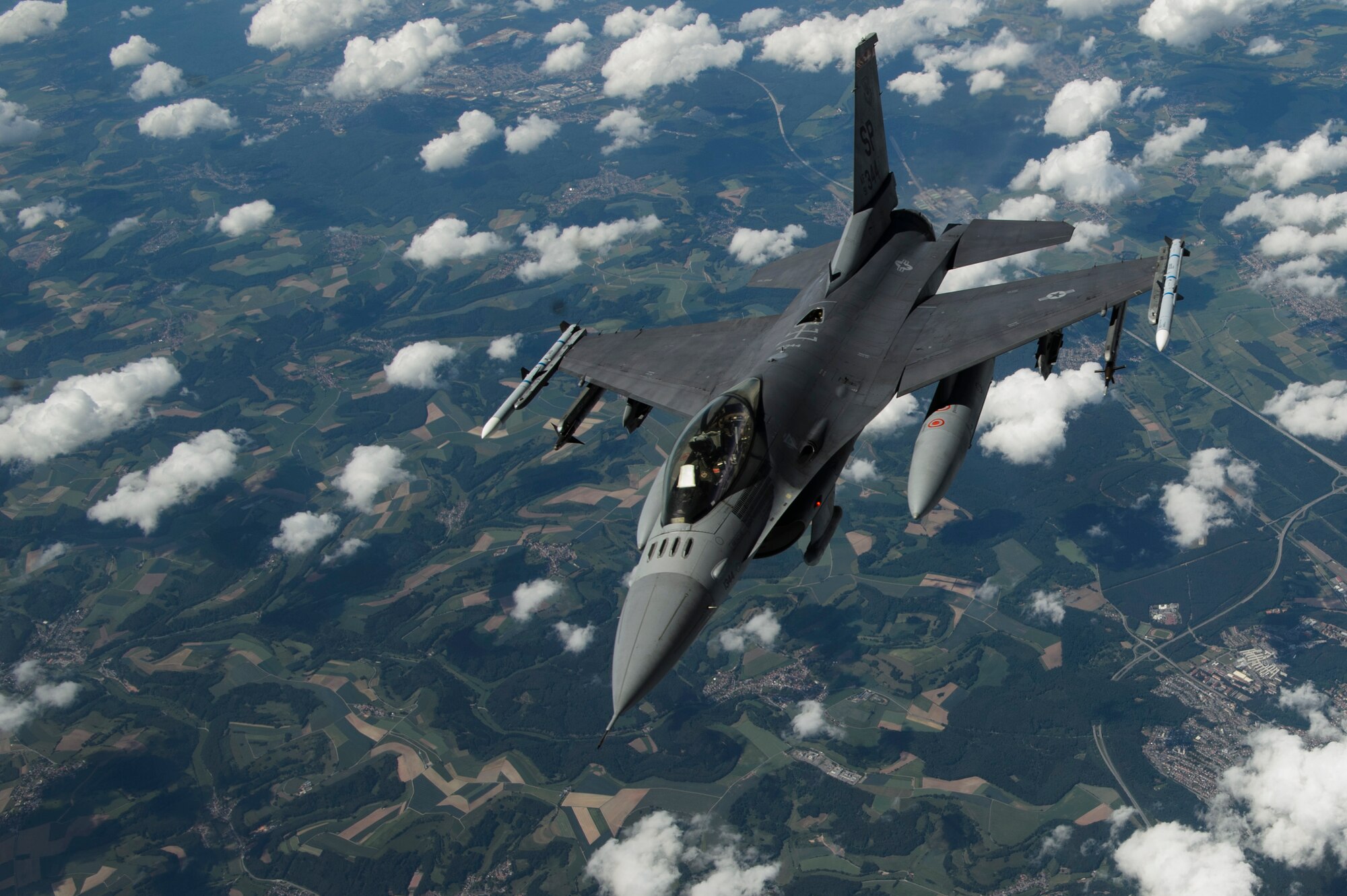 After refueling, the F-16 broke away from the KC-135R and continued its training.