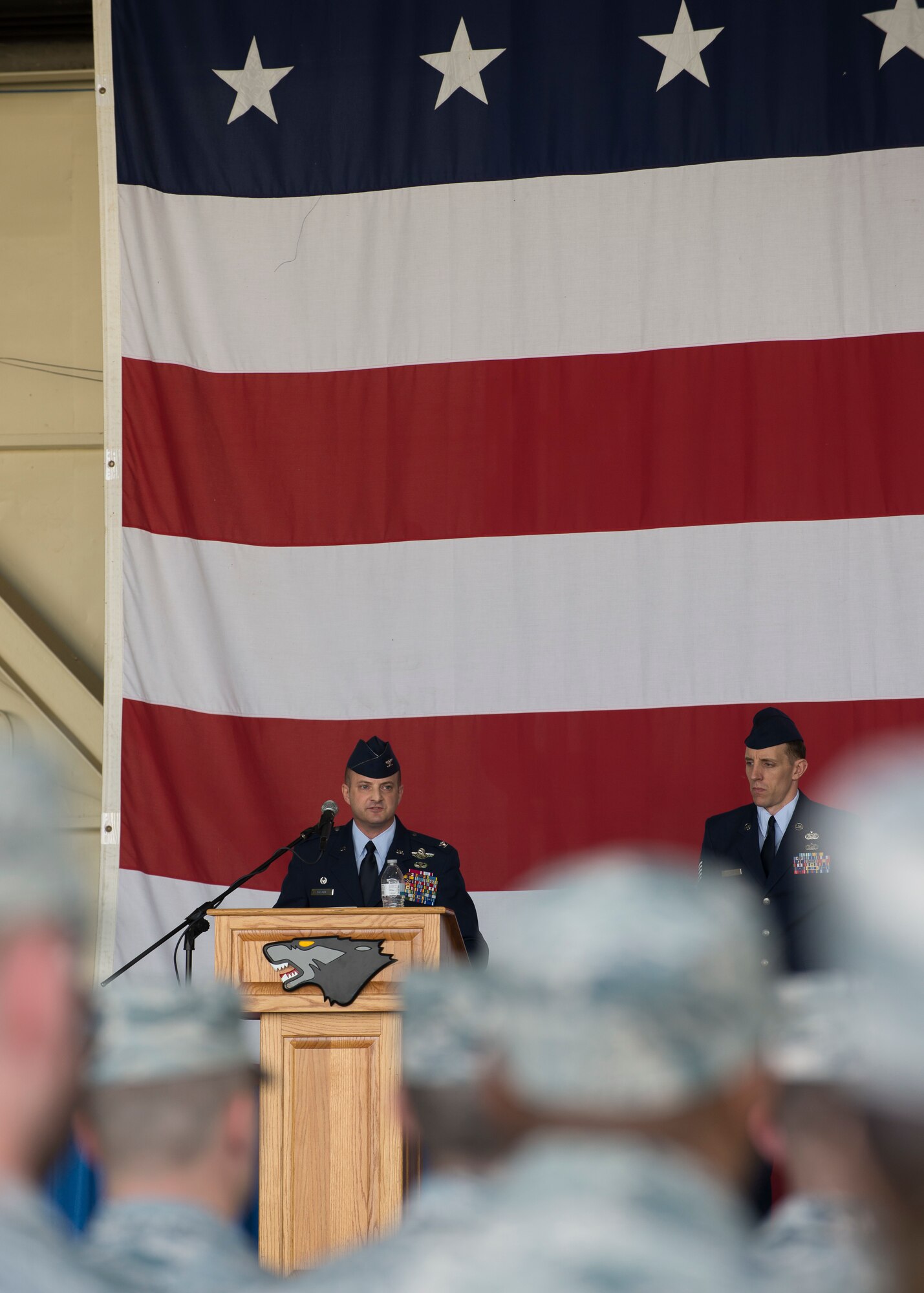 U.S. Air Force Col. John W. Bosone, 8th Fighter Wing commander, speaks during the wing’s change of command ceremony at Kunsan Air Base, Republic of Korea, June 1, 2018. The ceremony highlighted the relinquishment of command from one commander to the next, and the continuation of the Wolf Pack’s mission. (U.S. Air Force photo by Staff Sgt. Victoria H. Taylor)