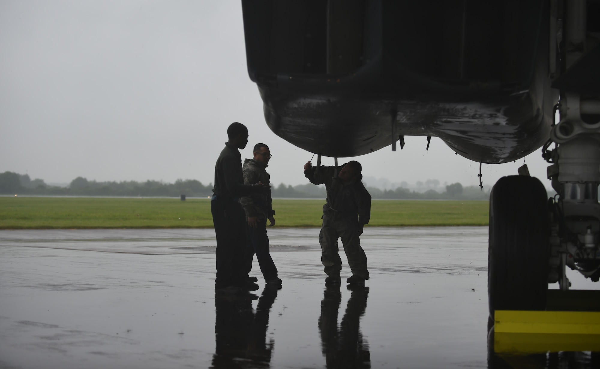 U.S. Air Force Airmen assigned to 345th Bomb Squadron at Dyess Air Force Base, Texas, conduct post-flight maintenance after the three-ship B-1B Lancer arrival at RAF Fairford, U.K., May 30, 2018. Maintenance members are responsible for ensuring the proper and timely servicing of the aircraft while at home station and deployed, which fortifies the bomber’s ability to combat targets, anytime and anywhere. (U.S. Air Force photo by Senior Airman Emily Copeland)