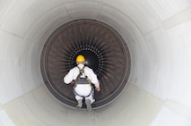Airman 1st Class Ryan Hobbs, 380th KC-10 crew chief, completes an intake and exhaust inspection on a KC-10 aircraft, Al Dhafra Air Base, United Arab Emirates, May 29, 2018. During the inspection, Hobbs checks fan blades for damage. (U.S. Air Force photo by Staff Sgt. Ross A. Whitley)