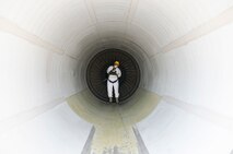 U.S. Air Force Airman 1st Class Ryan Hobbs, a crew chief with the 380th Expeditionary Aircraft Maintenance Squadron, completes an intake and exhaust inspection on a KC-10 aircraft engine at Al Dhafra Air Base, United Arab Emirates, May 29, 2018. Hobbs checked general hardware, engine and fan blades for any visible damage. (U.S. Air Force photo by Staff Sgt. Ross A. Whitley)