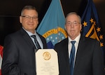 Mark Scott (right), DLA Troop Support Construction and Equipment integrated support team chief, poses for a photo with Troop Support Deputy Commander Richard Ellis (left) during a retirement ceremony May 31 in Philadelphia.